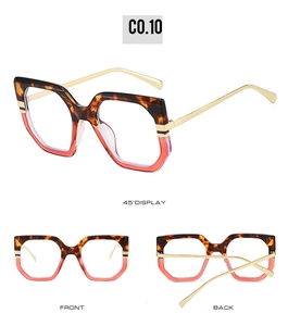 Detailed view of tortoise and gradient red square frames with gold metal temples