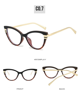 Cat eye glasses frames in black and tortoiseshell with slender gold metal temples