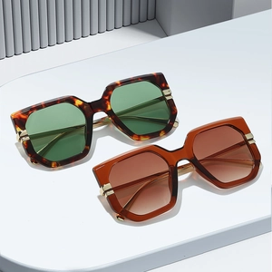 Retro oversized square sunglasses with tortoiseshell frames and gold metal accents