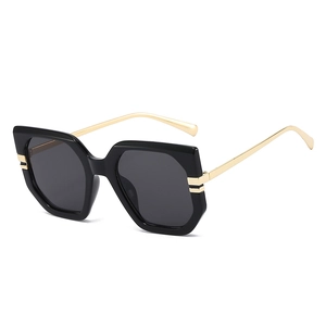 Chic oversized square sunglasses with black geometric frame and slim gold metal temples