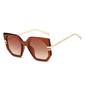 Women's vintage oversized square sunglasses with brown gradient lenses and gold temples