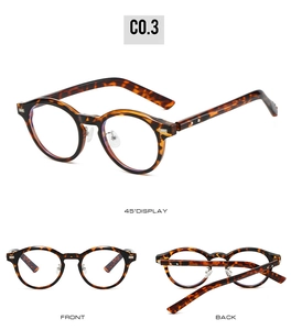 Detail view of oval tortoise shell TR frames with silver rivets and clear nose pads