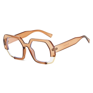 Polished amber polygonal sunglasses with hex frames shown at a 45-degree angle