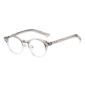 Retro oval TR frame glasses in transparent grey with metal core and rivet accents