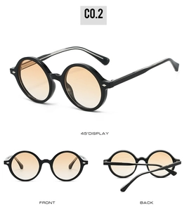 Vues détaillées de lunettes de soleil ovales vintage avec monture noire et verres orange
