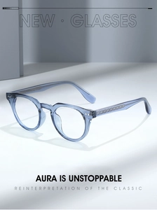 Detailed view of transparent blue TR90 glasses frame with visible silver patterned metal core