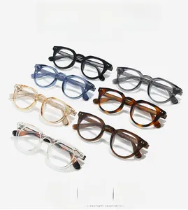 Detail view of colorful TR90 round frames with rivets and size specs on temples
