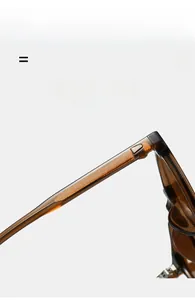 Detail view of transparent amber TR90 sunglasses showing flexible temple and metal hinge