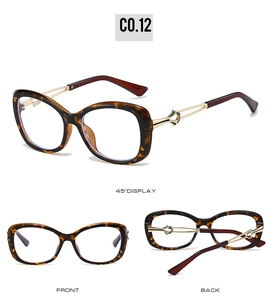 Macro detail of tortoiseshell frames with hollow metal temples and blue light lenses