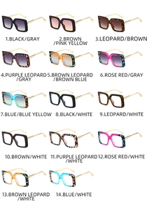 Matrix of 14 square frame sunglasses in assorted colors with gold metal temple detail