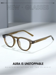 Detail view of transparent amber round frame glasses with embossed diamond pattern temples