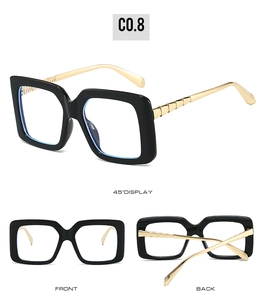 Three-angle view of square black sunglasses with gold tiered metal temples and clear lens