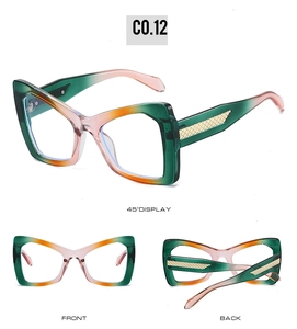 Cat eye sunglasses detail with 3-color gradient frame and gold mesh metal temples