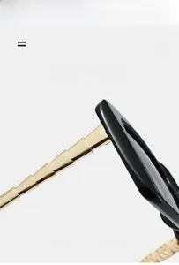 Detail of gold metal temples with tiered design on stylish black square sunglasses