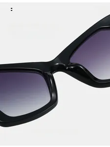 Detail of comfortable nose pads on black frame sunglasses with purple gradient lenses