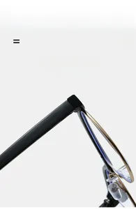 Detailed close-up of the high-precision metal hinges on black and gold cat-eye glasses