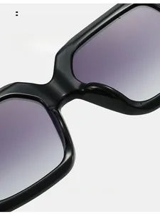 Detail of ergonomic nose pads on square frame sunglasses for comfort and no marks