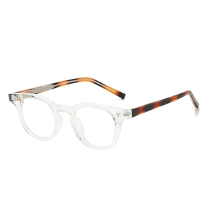 Lunettes rondes rétro transparentes avec branches écaillées et charnières en métal