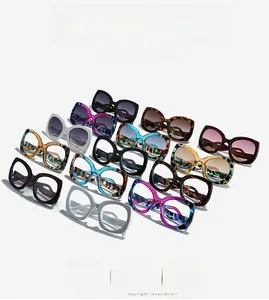 Matrix layout of retro butterfly sunglasses in various colors on a white background