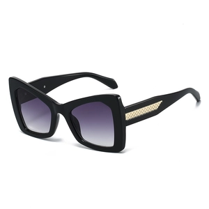 Fashionable oversized butterfly sunglasses with black frames and purple gradient lenses