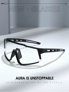 Close-up of black cycling goggles with hollow temple design and clear protective lens