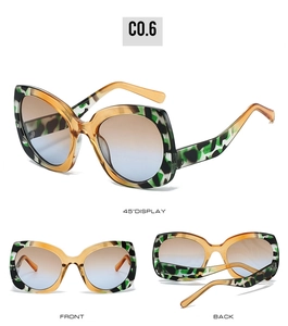 Detailed views of marbled butterfly sunglasses with gradient lenses and amber temples