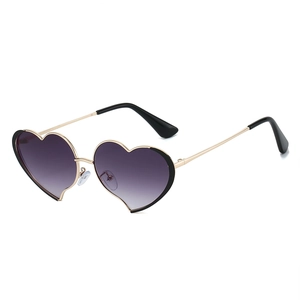 Gafas de sol de corazón con montura de metal dorado y lentes moradas degradadas