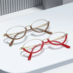 Modern metal and acetate half-rim glasses frames in brown and red with gold accents