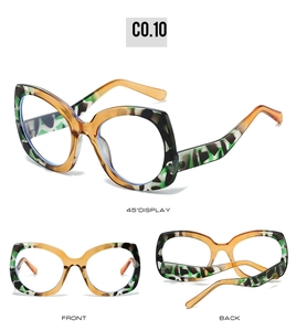 Three-angle view of oversized butterfly sunglasses with green and amber tortoiseshell pattern