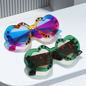 Chic heart-shaped rhinestone sunglasses with gradient lenses and vibrant frames for party