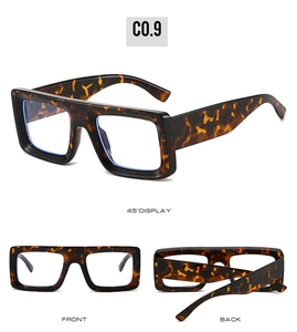 Detail view of square tortoiseshell sunglasses with light blue lenses and chunky frames