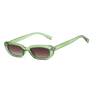 Lunettes de soleil œil-de-chat rétro avec monture verte et verres dégradés