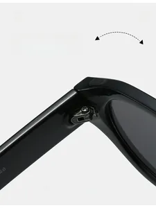 Detail of durable metal hinges on high-quality black stylish sunglasses for daily wear
