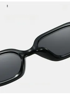 Detail view of ergonomic integrated nose pads on black stylish square sunglasses
