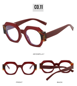 Detail view of bold red geometric sunglasses with tortoiseshell accents from multiple angles