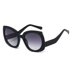Retro butterfly cat-eye sunglasses with thick black frame and purple gradient lenses