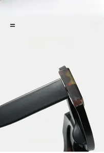 Detail of round sunglasses hinge with tortoiseshell accent and super elastic frame