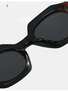 Close-up of comfortable integrated nose pads on black oversized fashion sunglasses