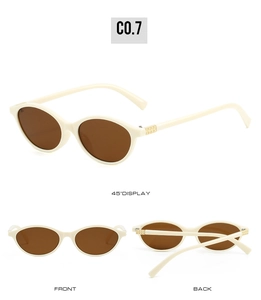 Detail view of oval sunglasses with creamy white frames and dark brown lenses from multiple angles