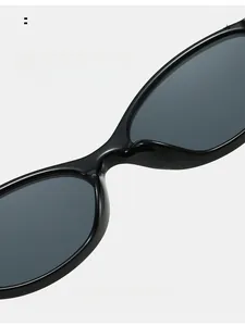 Detailed close-up of the integrated comfortable nose pads on black oval sunglasses