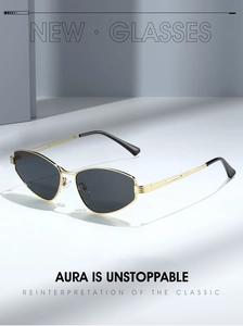 Close-up of golden irregular geometric sunglasses with grey lenses on a sleek background