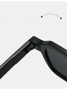 Detail of durable texture hinge and metal screw connection on black polygon sunglasses
