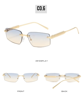 Detail view of rimless square sunglasses with gradient lenses and studded metal temples