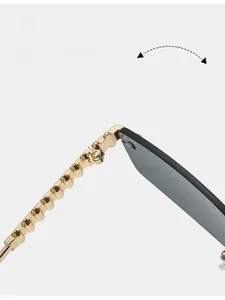 Close-up of durable metal hinge with golden rivet texture on square rimless sunglasses