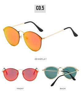 Detailed views of vintage round sunglasses with gold metal frames and red coated lenses