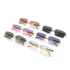 Square rimless sunglasses collection with studded metal temples and gradient lenses