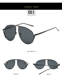 Détails des lunettes de soleil aviateur avec monture en métal noir et verres foncés