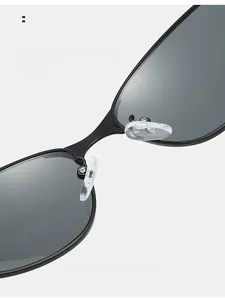 Macro view of comfortable transparent nose pads on black retro cat-eye sunglasses