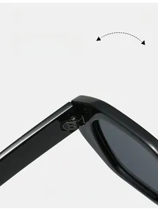 Macro detail of the durable metal hinge on these trendy small frame black sunglasses