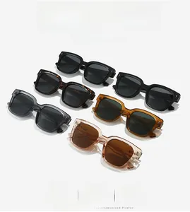 Macro display of TR90 square sunglasses in six assorted colors with metal cross detail
